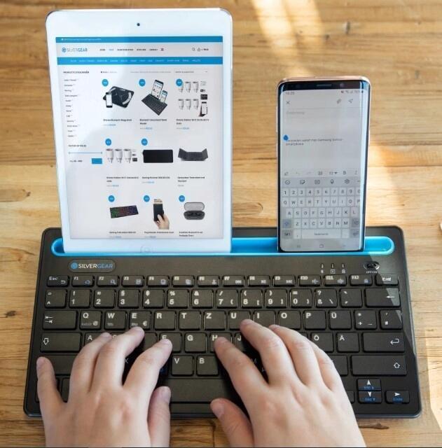 Bezprzewodowa klawiatura z uchwytem na smartfon z układem QWERTY 9570 (2)
